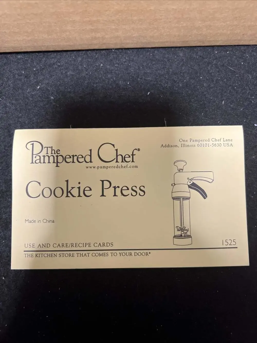 The Pampered Chef 1525 Cookie Press with 16 Discs - White